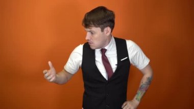 The man shows the middle finger. Middle age handsome man, Showing middle finger, impolite and rude fuck off expression