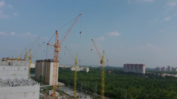 Modern building under construction with crane. building with a high crane — Stock Video