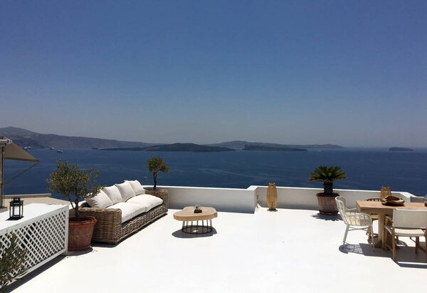 A beautiful terrace in Santorini with spectacular view of sea.