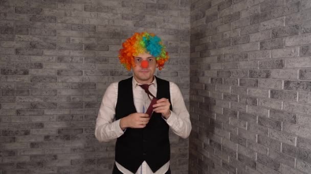 Young clown businessman working in the office — Stock Video