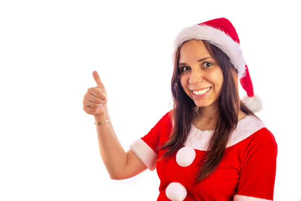 Lächelnd blickt die schöne junge Frau im Weihnachtsmannanzug in die Kamera auf weißem Hintergrund. Frohe Weihnachten und ein gutes neues Jahr. — Stockfoto