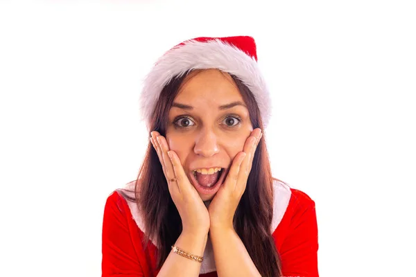 Sorrindo bela jovem mulher em terno de Papai Noel está olhando — Fotografia de Stock