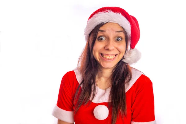 Lachende mooie jonge vrouw in Santa Claus pak op een witte achtergrond. Vrolijk Kerstfeest en Gelukkig Nieuwjaar. — Stockfoto