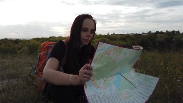 Woman Traveler Backpack Looking Map — Stock Video
