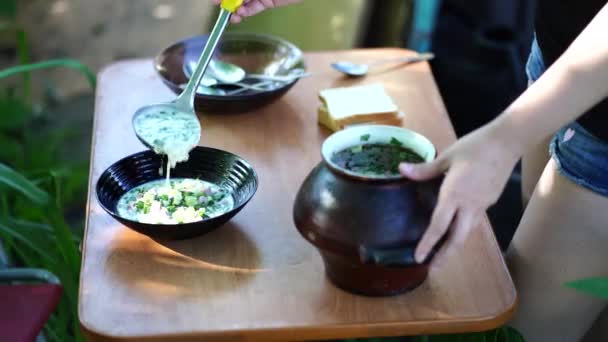 Okroshka Russian Cold Soup Woman Pours Soup Plates Standing Fresh — Stock Video