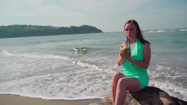 Beautiful Young Woman Sitting Log Drinking Coconut Sea Ocean Bright — Stock Photo, Image