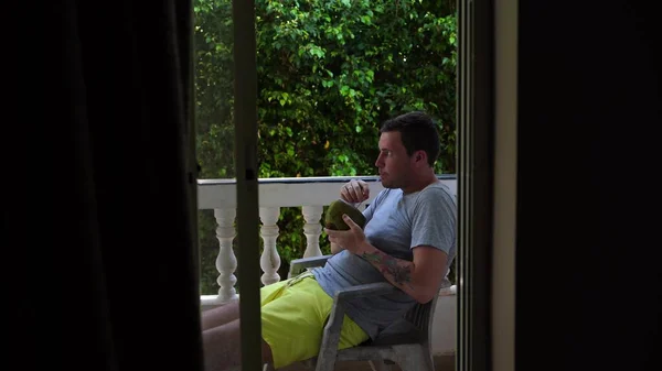 Handsome Young Man Sitting Chair Drinking Coconut Terrace — Stock Photo, Image