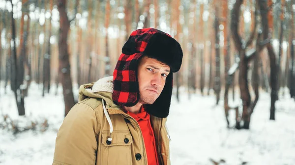 Serious Young Male Wearing Beige Jacket Red Hoodie Earflap Hat — Stock Photo, Image