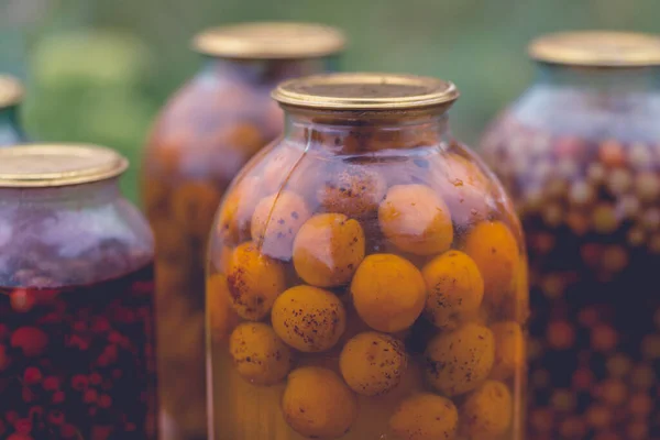 Close Canned Juice Fruits Berries Sealed Jars Compote Blurred Background — Stock Photo, Image