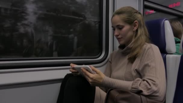 Beautiful Young Woman Holding White Tablet Traveling Train — Stock Video