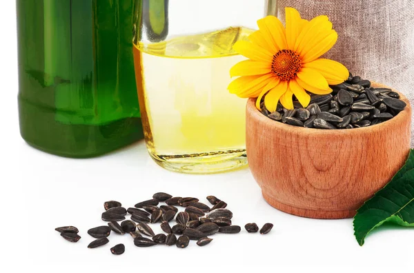 Sunflower Oil Glass Bottles Sunflower Seeds Sack Rustic Wooden Bowl — Stock Photo, Image