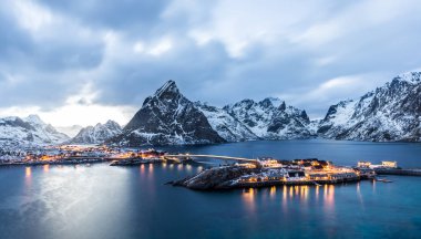 Sakrisoy, Lofoten, Norway at blue hour seen from the hill in front clipart