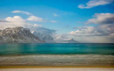 Dreamy Haukland beach in Lofoten, Norway after the storm clipart