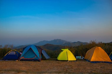 Field Tent of the tourists on the mountain Nern Chang Suek  hills, Kanchanaburi, Thailand clipart