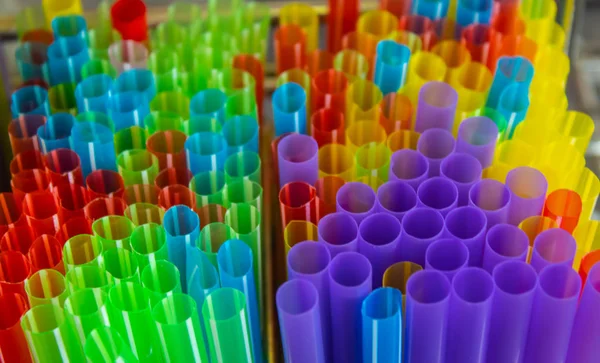 Drinking straws colorful coming together.
