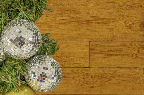 Glass ball ornaments on a Christmas tree Background Plywood Floor With Wood Pattern with clipping path.