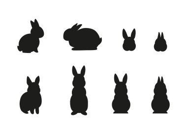 Beyaz arka plan üzerinde izole basit siyah farklı tavşan siluetleri kümesi. - Vektör