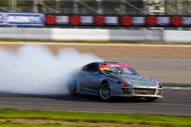MOSCOW, RUSSIA - MAY 05, 2018: Russian Drift Series 2018, first stage at Moscow Raceway motordrome clipart