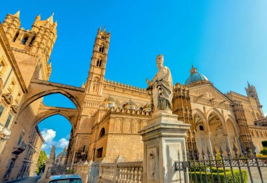 Side view of Palermo Cathedral (Duomo di Palermo) in Palermo, Sicily, Italy clipart