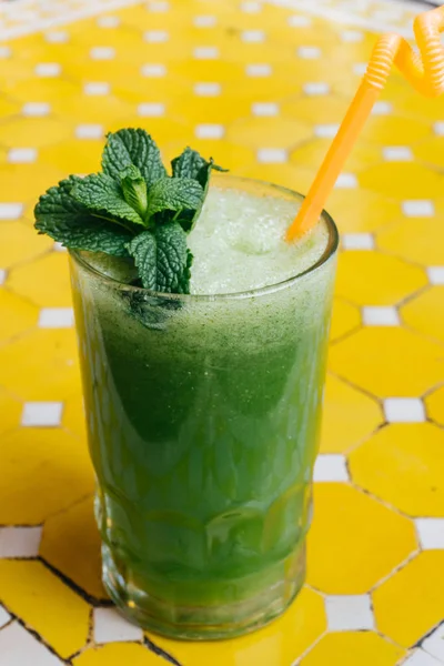 Green vegetable smoothie. Avocado smoothie, cucumber smoothie, spinach smoothie, non alcogolic mojito, detox. Summer concept