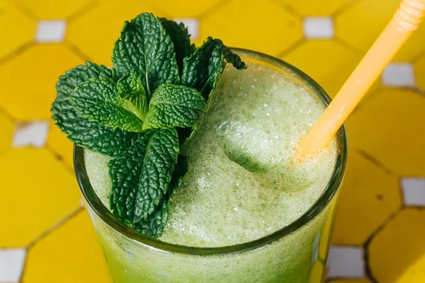 Green vegetable smoothie. Avocado smoothie, cucumber smoothie, spinach smoothie, non alcogolic mojito, detox. Summer concept