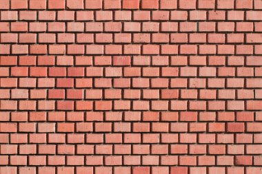 Eski tuğla duvar. Köy tarzında eski bir tuğladan yapılmış tuğla. Yıkılmış taş duvarın yapısı ve deseni. Boşluğu kopyala.