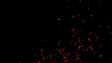  Siyah arka planda ateş ve şenlik ateşinden kıvılcımlar yalıtılmış. Kıvılcım arkaplanı