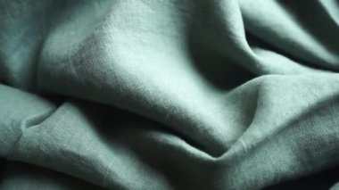 Keten kumaş arka plan. Kumaş dokusu ve desenli keten kumaş. Giysi üretimi ve doğal çevre dostu malzemeler.