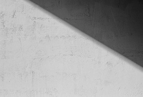Shadows on the gray concrete wall from the sun. Shadow backgroun