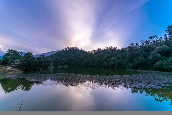 Фото Reflection in Deoria Tal in Himalayas - Sari Village Chopta, Uttarakhand

