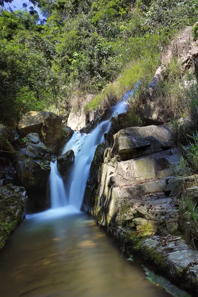 Small water fall in the forest with magic of light and long exposure. Hight quality photo use for printing, advertising, design and more