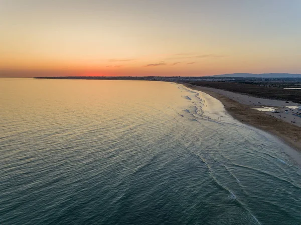 Aerial sunset seascape of Salgados beach in Albufeira, Algarve tourism destination region, Portugal. — Stock Photo, Image