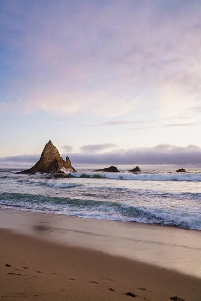 Kumsalda pembe gün batımı