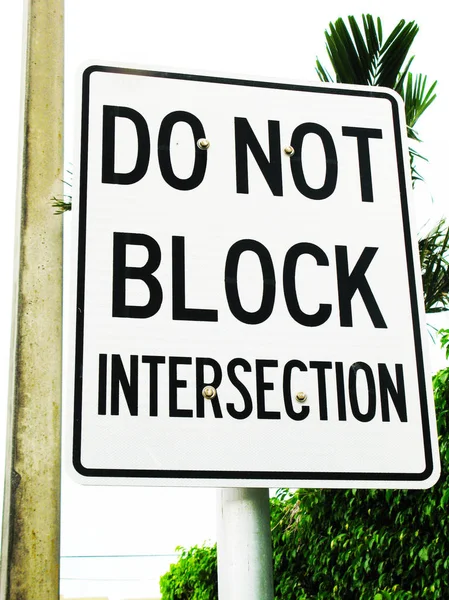 Bloquee Esta Intersección Metal White Sign —  Fotos de Stock