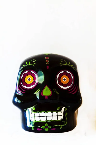 Black ceramic mini sugar skull facing forward. Die of the Dead Sugar Skull Ceramic Decoration