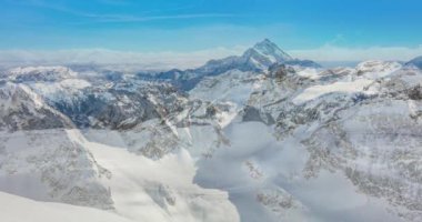 Kış Mt. Titlis - Bern İsviçre kantonları ve Obwalden sınırında bulunan bir dağ üzerinde. Geçerli yakınlaştırma kullanarak 6 hala kare ve çapraz-fade geçişler bir slayt gösterisi yapılmış.