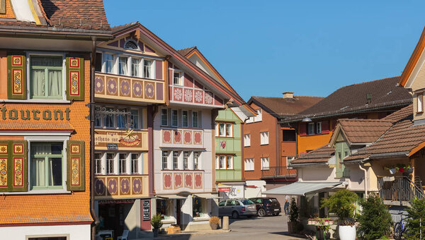 Appenzell, Switzerland - September 20, 2018: buildings of the historic part of the town of Appenzell. Appenzell is the capital of the Swiss canton of Appenzell Innerrhoden, known for its ornamented buildings.