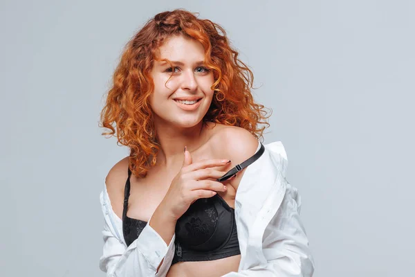 stock image Redhead girl in black lingerie and white shirt