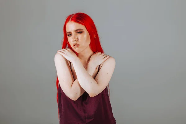 Portrait of a girl with red long hair — Stock Photo, Image