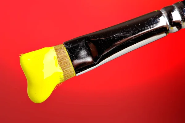 Yellow Paint Dripping Brush — Stock Photo, Image