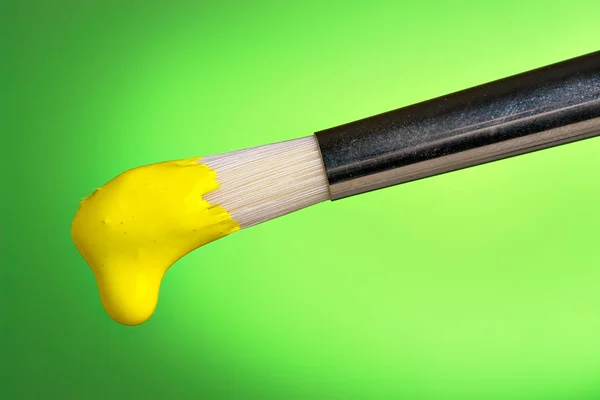 Yellow Paint Dripping Brush — Stock Photo, Image