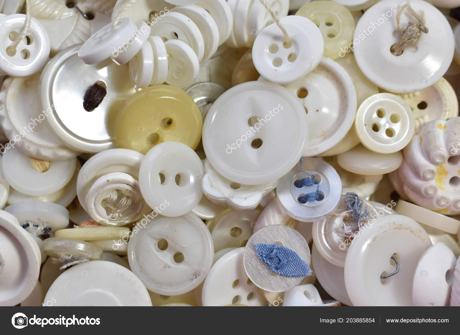 white sewing buttons