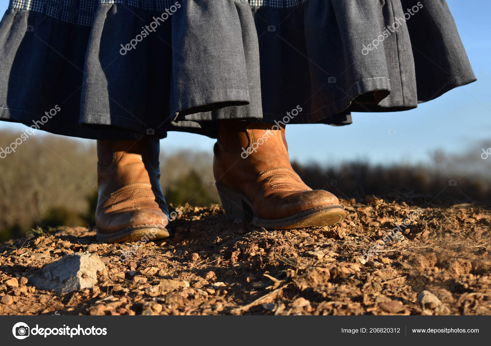 jean skirt and cowboy boots