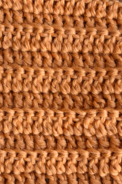 a vertical or horizontal of a seamless tan crocheted background