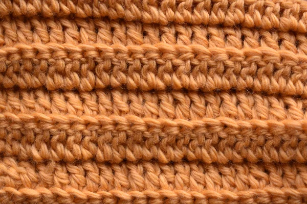 a vertical or horizontal of a seamless tan crocheted background