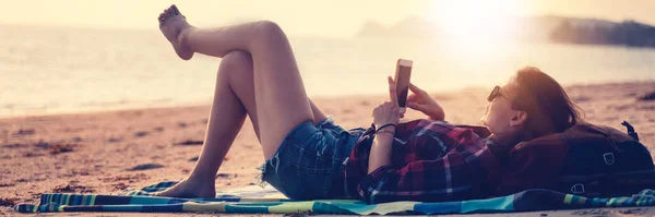 Happy Young Woman Resting Lying Smartphone Hands Sunset Beach — Stock Photo, Image