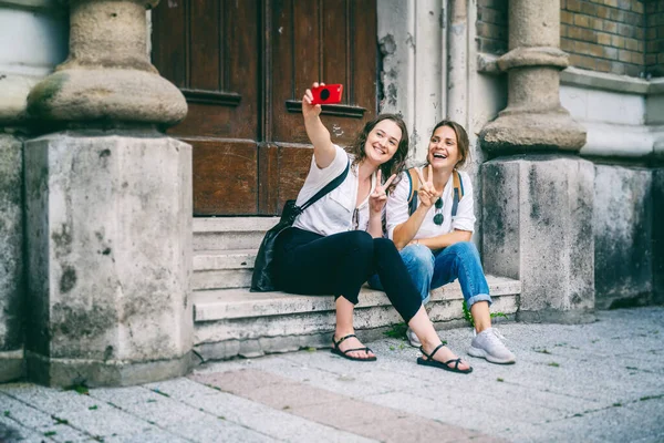Two Young Happy Pretty Female Students Taking Selfie Mobile Phone — Stock Photo, Image