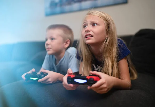 Children playing video games