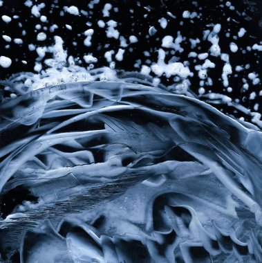 Arka plan. Siyah bir arka plan üzerinde çeşitli beyaz noktalar ve çizgiler vardır.