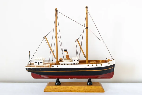 Model ship on white background